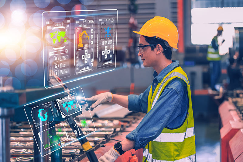 Photo of industrial worker working in factory.